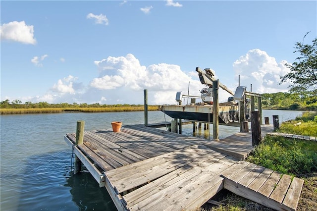 view of dock with a water view