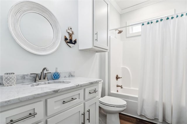 full bathroom featuring vanity, wood-type flooring, shower / bath combination with curtain, and toilet