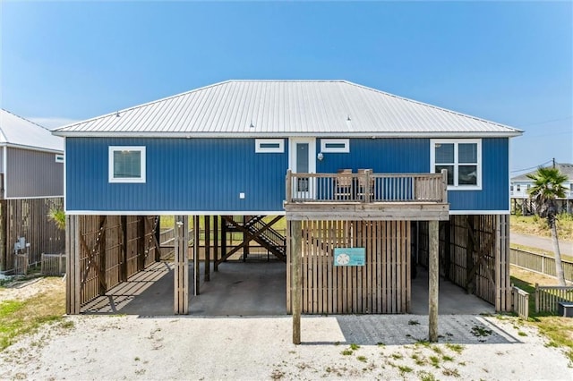 view of front of property with a carport