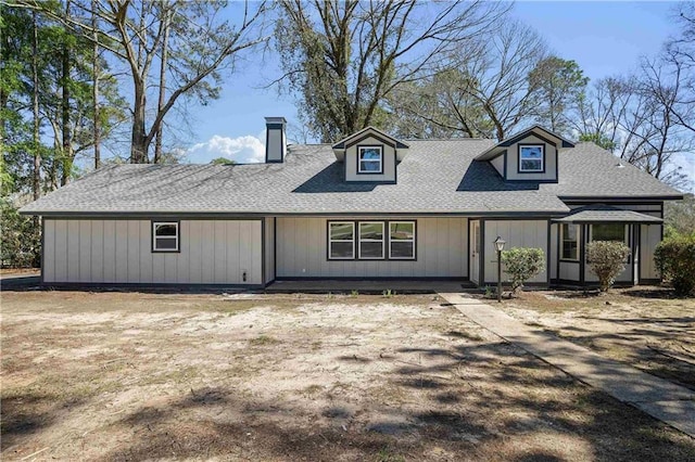 view of front of home with roof with shingles