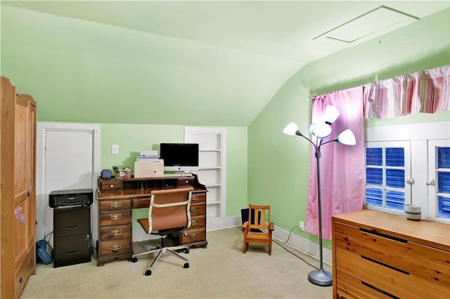 office space featuring lofted ceiling and carpet flooring