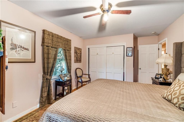 bedroom featuring ceiling fan and a closet