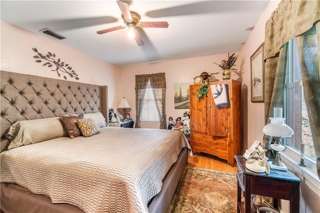 bedroom featuring ceiling fan and light wood-type flooring