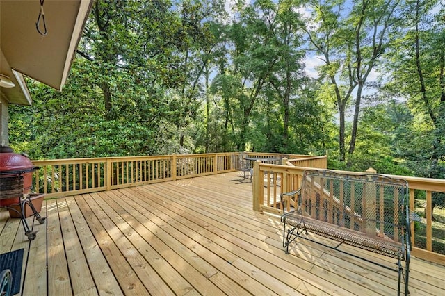 wooden deck with area for grilling