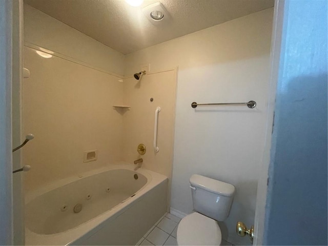 bathroom with toilet, a textured ceiling, tile patterned flooring, and  shower combination