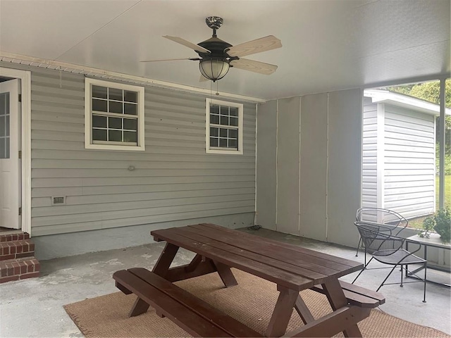 view of patio / terrace featuring ceiling fan