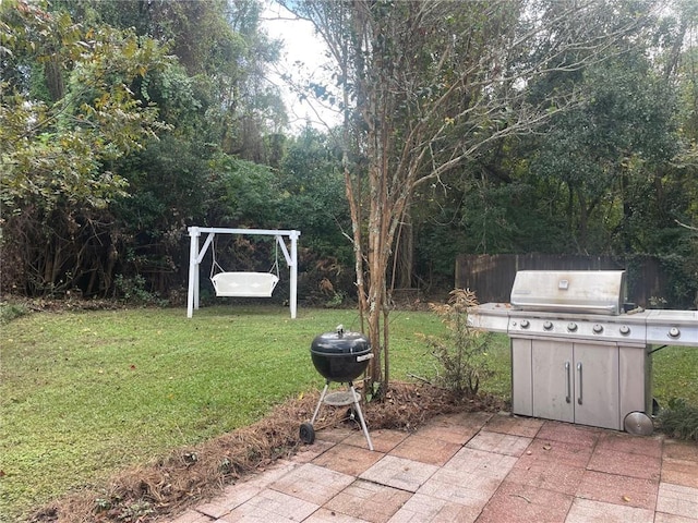 view of patio with a grill