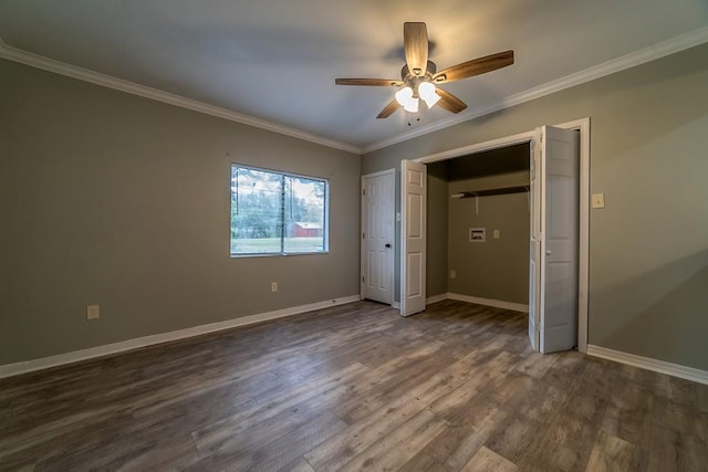 7520 Oak Dr W, Theodore, AL 36582 - unfurnished bedroom featuring ornamental molding, ceiling fan, and dark hardwood / wood-style flooring