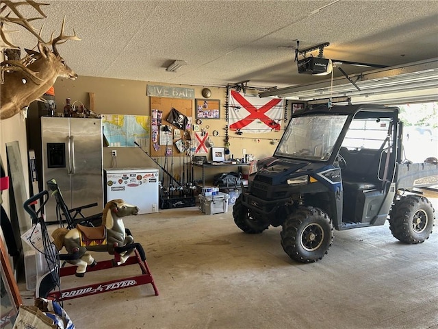 garage featuring stainless steel refrigerator with ice dispenser and a garage door opener