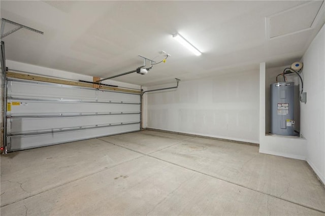 garage featuring a garage door opener and water heater