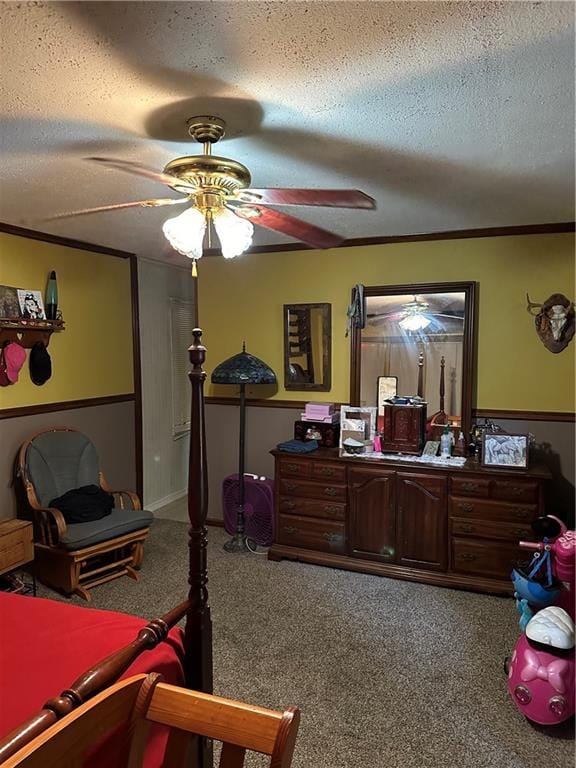 home office with ceiling fan, a textured ceiling, and carpet flooring