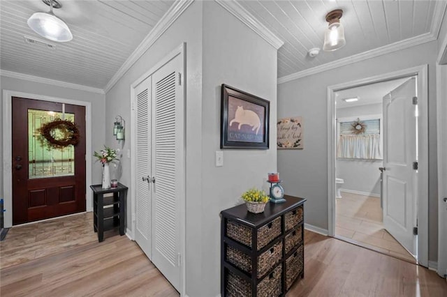 3120 Riviere Du Chien Loop W, Mobile, AL 36693 - foyer entrance featuring light wood-type flooring and ornamental molding