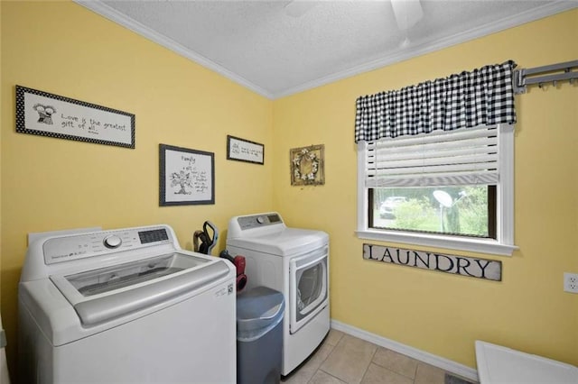 3120 Riviere Du Chien Loop W, Mobile, AL 36693 - washroom with washing machine and clothes dryer, crown molding, a textured ceiling, light tile patterned floors, and ceiling fan