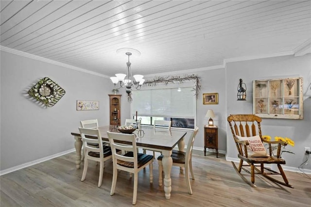 3120 Riviere Du Chien Loop W, Mobile, AL 36693 - dining space featuring a chandelier, light wood-style flooring, crown molding, and wooden ceiling