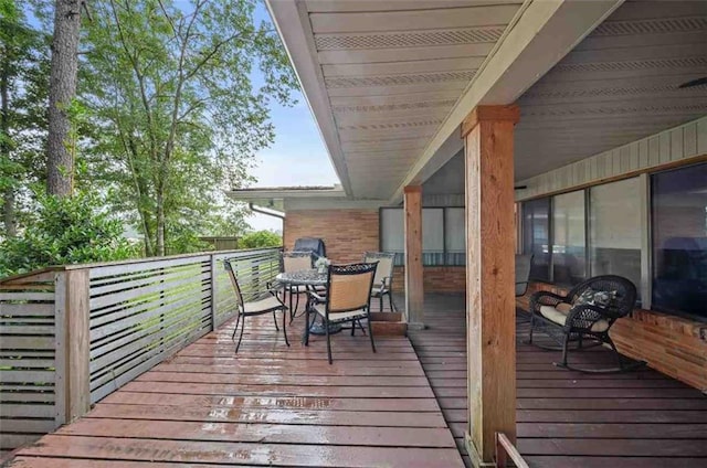 3120 Riviere Du Chien Loop W, Mobile, AL 36693 - wooden deck featuring outdoor dining space and a grill