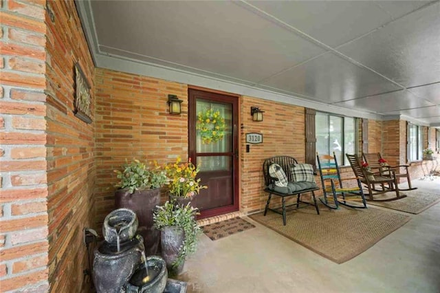 3120 Riviere Du Chien Loop W, Mobile, AL 36693 - entrance to property featuring brick siding and a porch