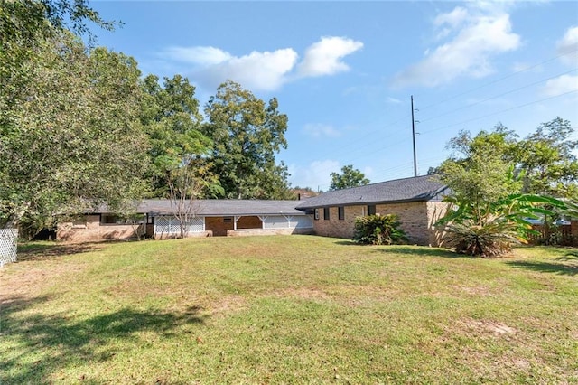 exterior space featuring a front lawn