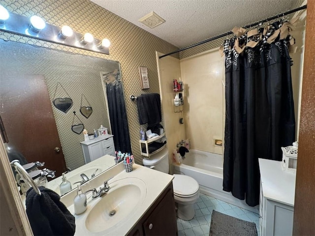 full bathroom featuring vanity, shower / tub combo, a textured ceiling, and toilet