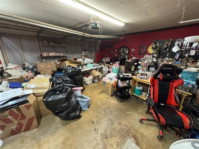 garage with a garage door opener and a workshop area