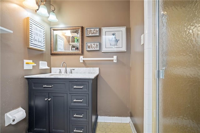 bathroom with vanity and an enclosed shower