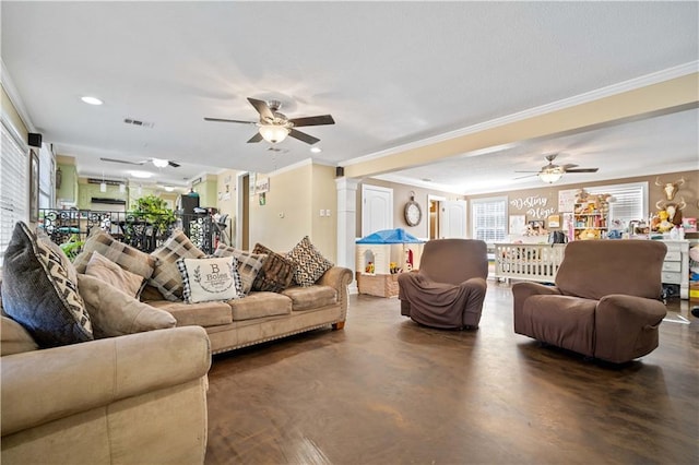 living room with decorative columns, crown molding, and ceiling fan