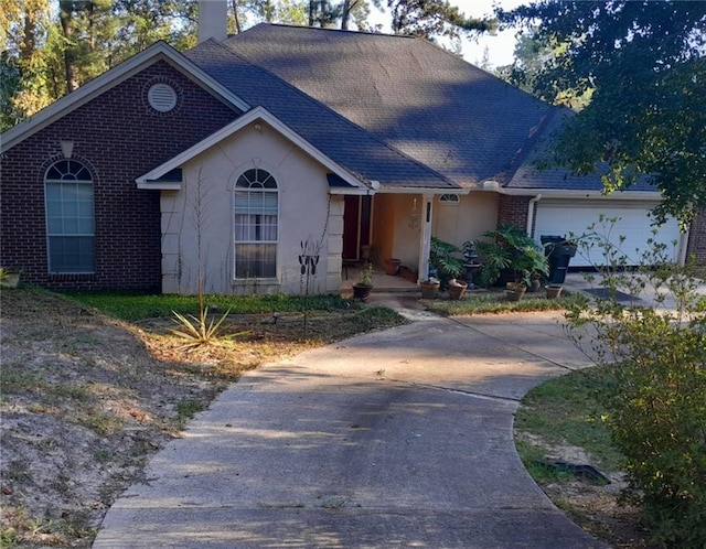 view of front of house with a garage