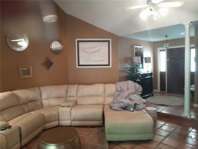 living room with decorative columns, ceiling fan, and tile patterned floors