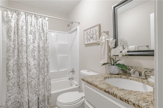 full bathroom featuring a textured ceiling, vanity, toilet, and shower / bathtub combination with curtain