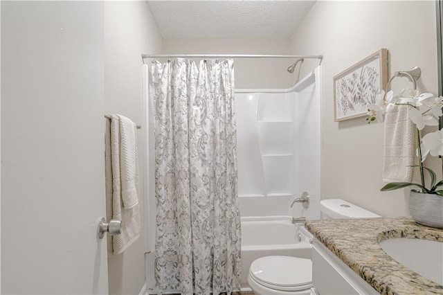 full bathroom with shower / bathtub combination with curtain, vanity, toilet, and a textured ceiling