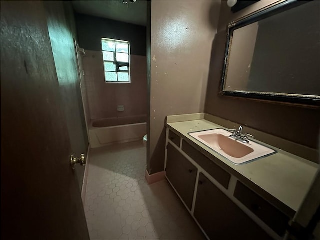 bathroom featuring tile patterned floors and vanity