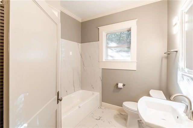 full bathroom with crown molding, sink, washtub / shower combination, and toilet