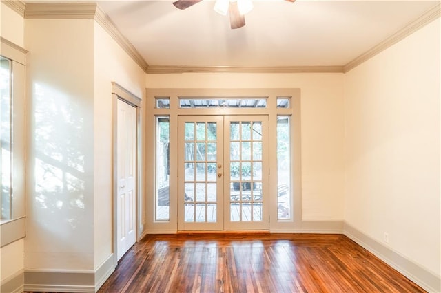 doorway to outside with ceiling fan, dark hardwood / wood-style flooring, ornamental molding, and french doors