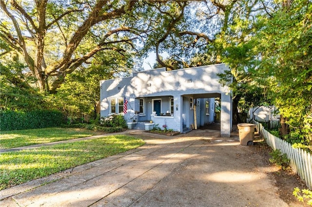 view of front facade with a porch and a front lawn