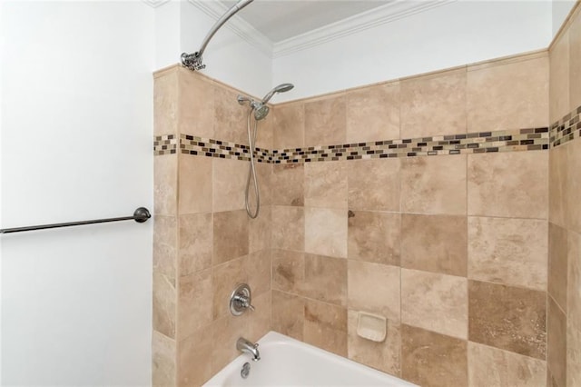 bathroom with crown molding and shower / washtub combination