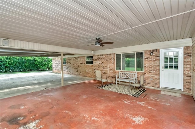 view of patio featuring ceiling fan