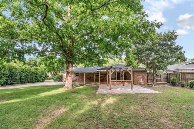 rear view of house with a pergola, a patio area, and brick siding