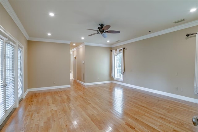 empty room with light hardwood / wood-style flooring, ceiling fan, and ornamental molding