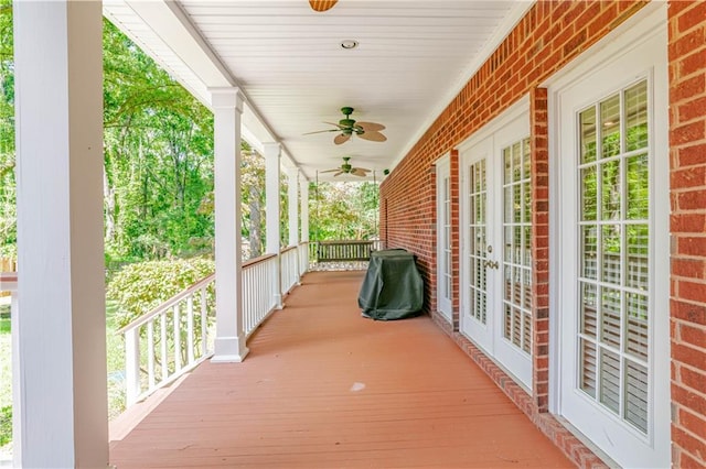 exterior space featuring ceiling fan and french doors