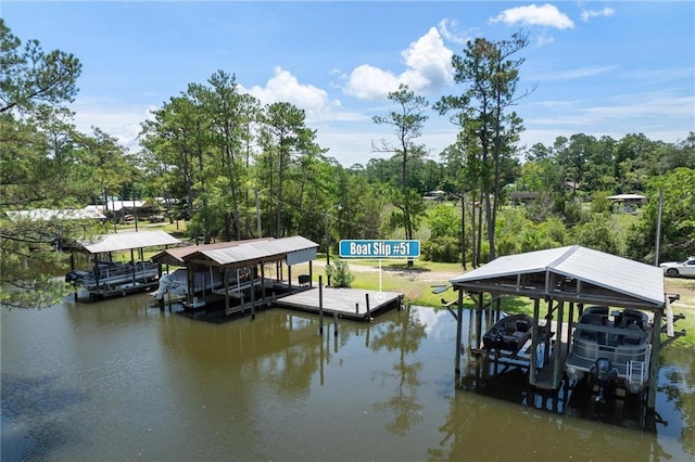 7471 Oak Dr, Foley, AL 36535 - dock area featuring boat lift, a water view, and view of wooded area