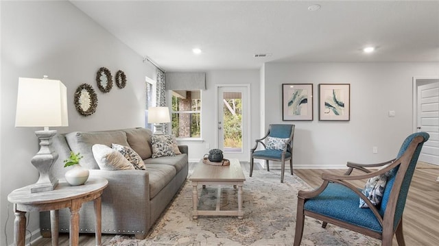 10471 Lowell St W, Mobile, AL 36695 - living area featuring wood finished floors, baseboards, and recessed lighting