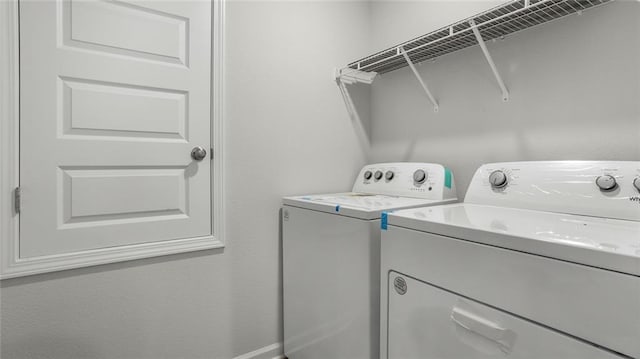 10471 Lowell St W, Mobile, AL 36695 - laundry area featuring washer and dryer and baseboards