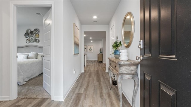 10471 Lowell St W, Mobile, AL 36695 - hall with light wood-style flooring and baseboards
