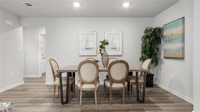 10471 Lowell St W, Mobile, AL 36695 - dining area featuring wood finished floors, baseboards, and recessed lighting