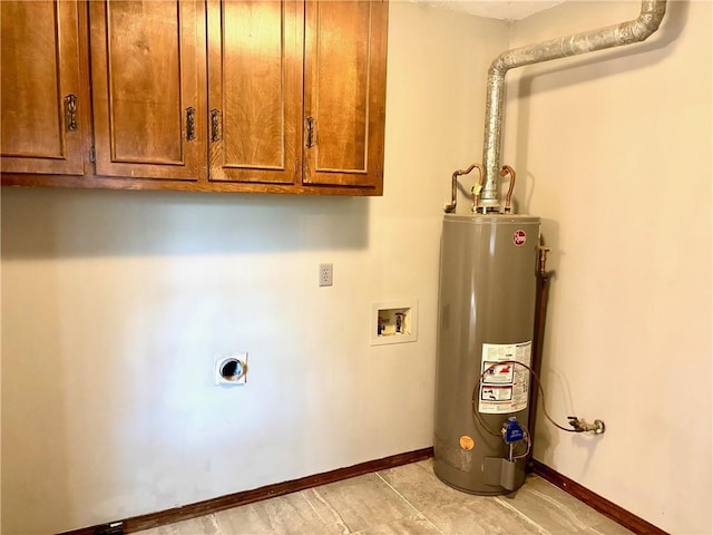 laundry area featuring baseboards, gas water heater, electric dryer hookup, cabinet space, and washer hookup