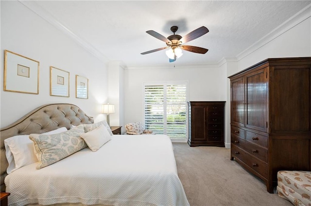 bedroom with ceiling fan, light colored carpet, and ornamental molding