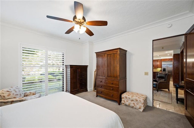 carpeted bedroom featuring ceiling fan, ornamental molding, and built in refrigerator