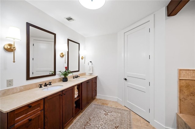 bathroom featuring vanity and tile patterned floors