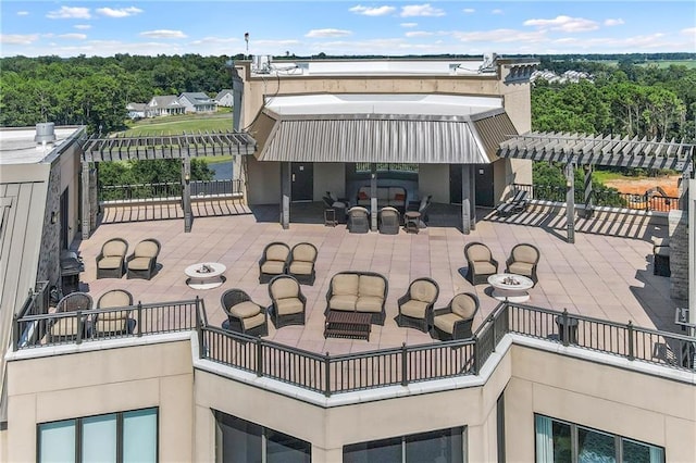 exterior space featuring an outdoor living space and a pergola