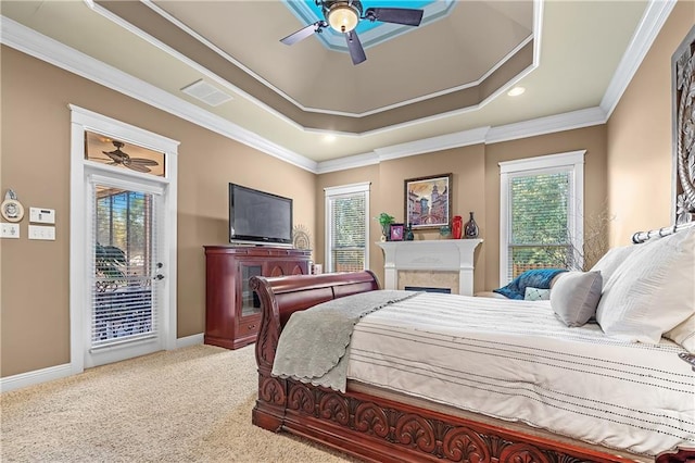 carpeted bedroom featuring ornamental molding, access to exterior, and ceiling fan