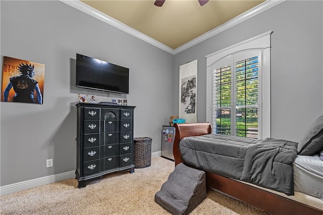 carpeted bedroom with crown molding and ceiling fan